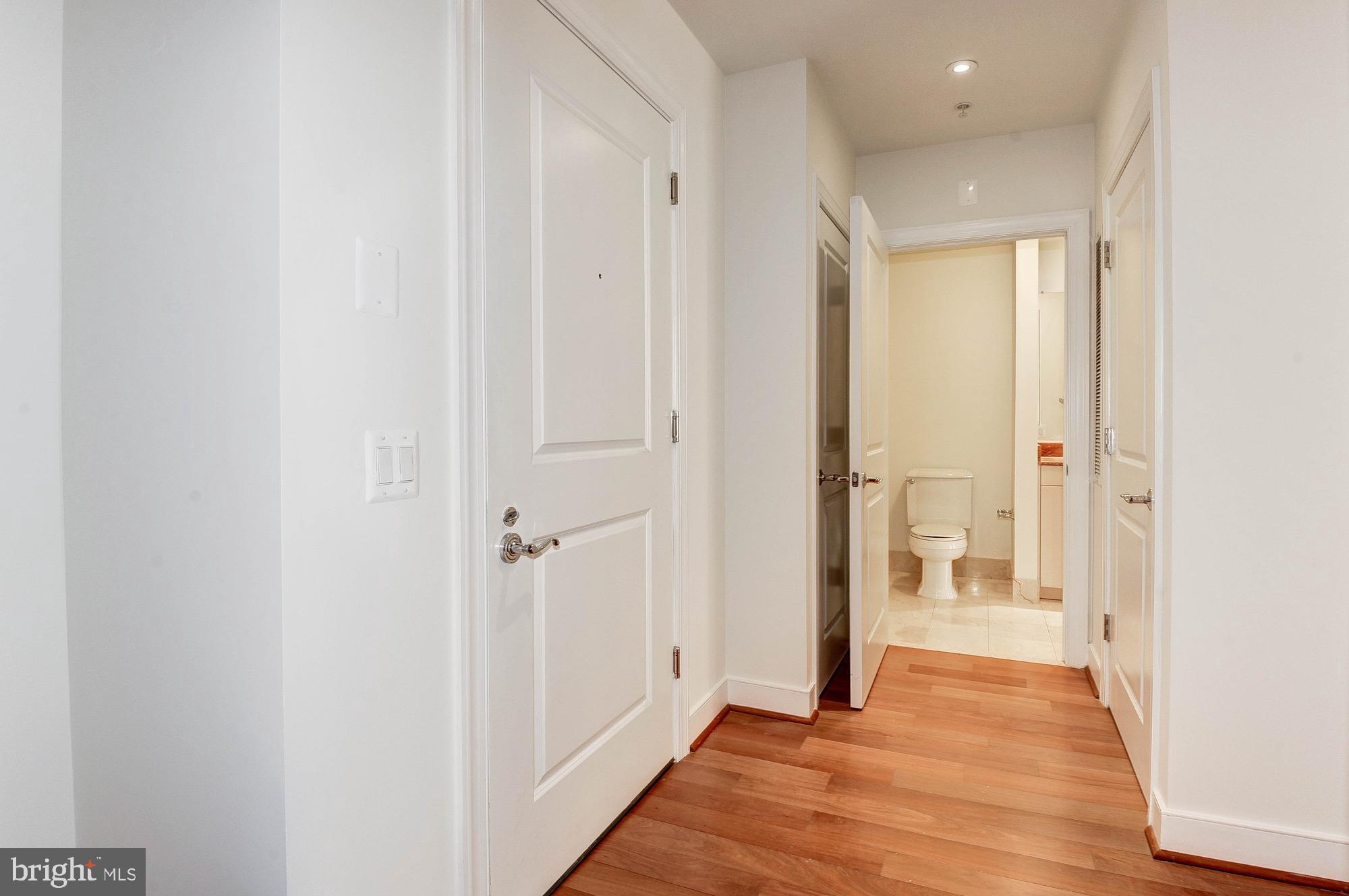2425 L Street Northwest, Unit 434 Washington, DC 20037 - Photo 24 of 37 Hardwoods throughout common living area