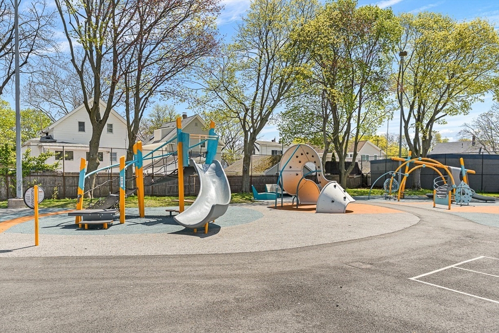 18 St Clair Street, Unit 3 Lynn, MA 01902 - Photo 27 of 36 a view of a park with swings and slides