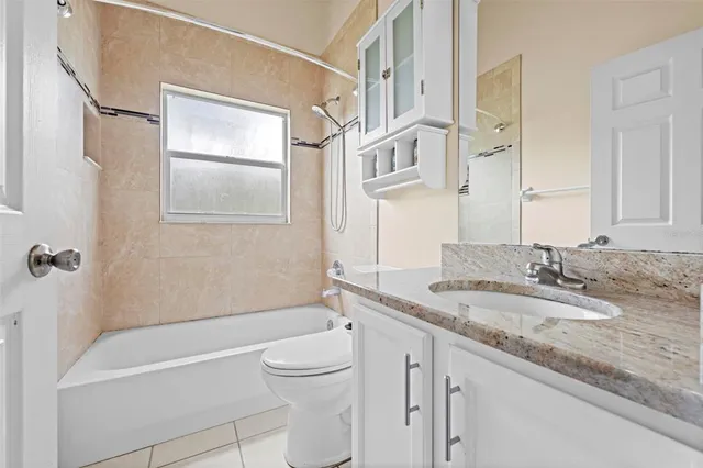 a swimming pool with wooden fence