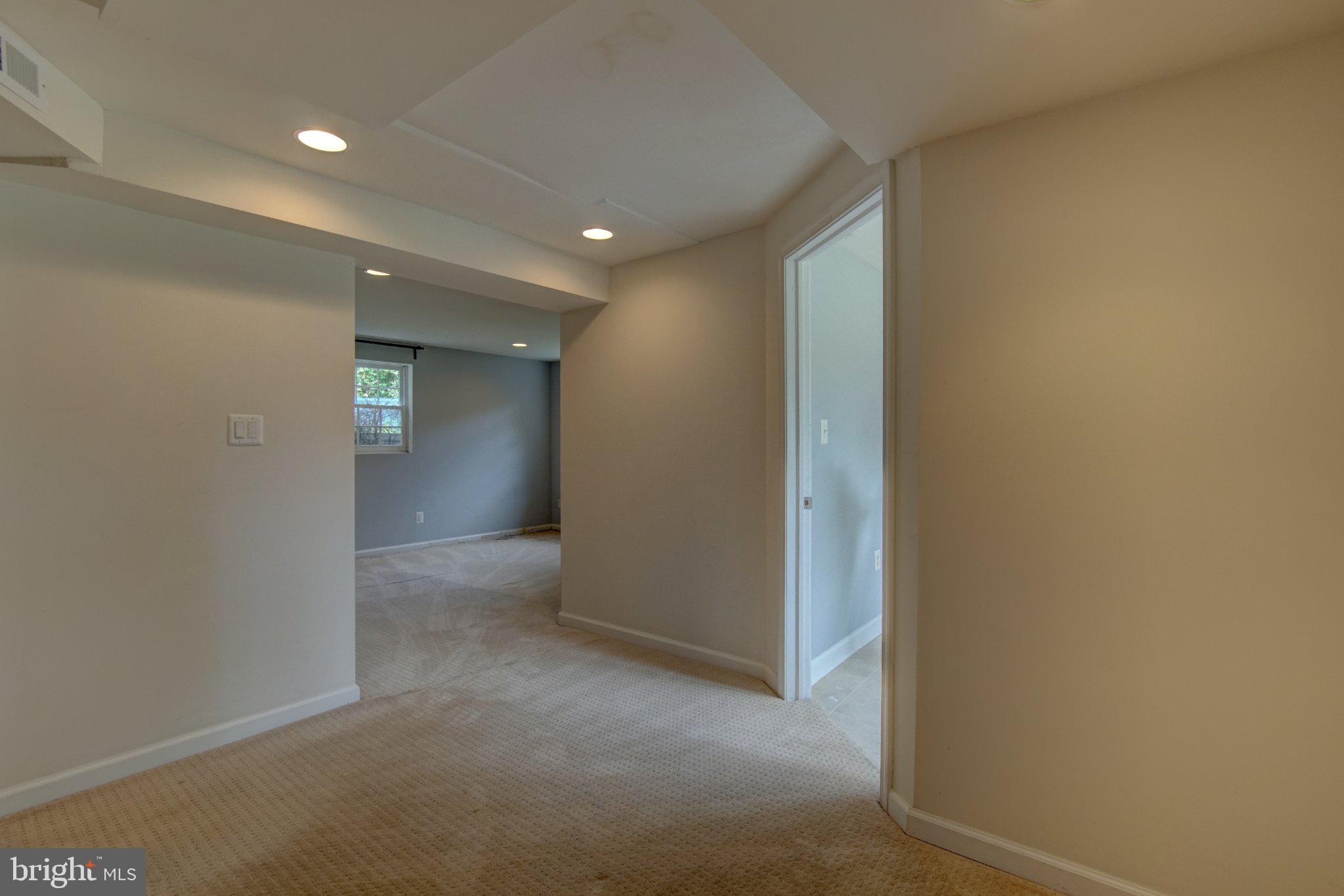 900 Walker Road Great Falls, VA 22066 - Photo 37 of 52 Spacious hallway with natural light.