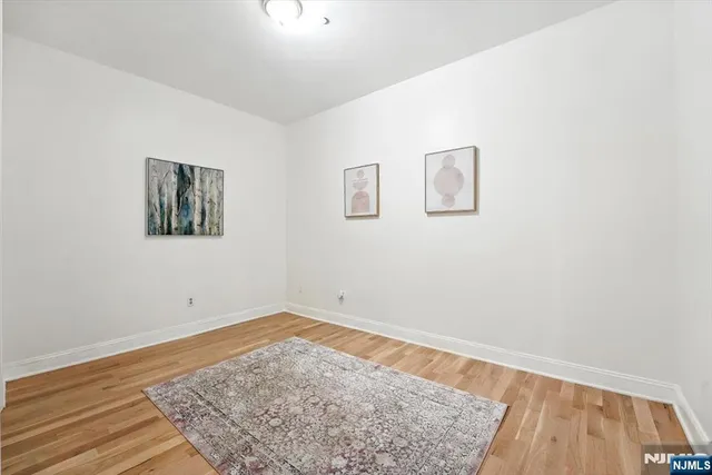 an empty room with a bench