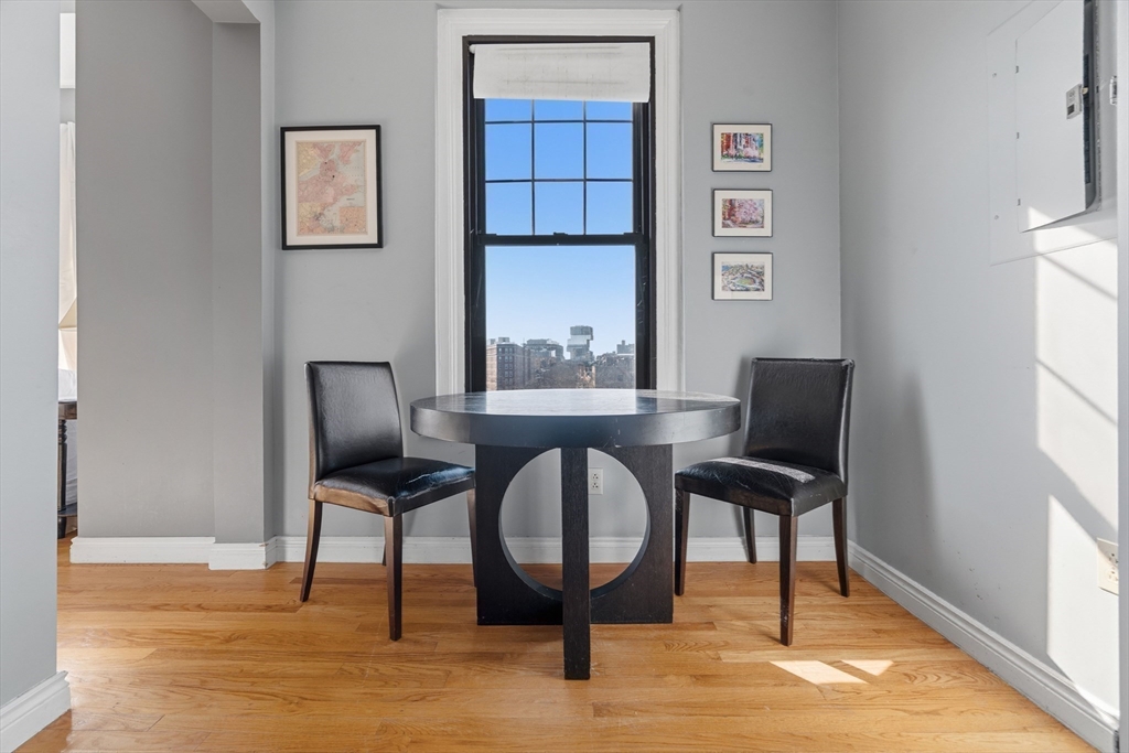4 Charlesgate East, Unit 606 Boston, MA 02215 - Photo 8 of 25 a view of a workspace with furniture and a window