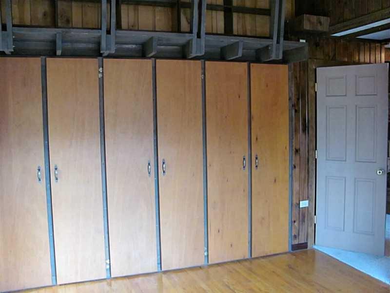 220 Medical Center Road Chicora, PA 16025 - Photo 18 of 19 Library Photo 2 of 3. Notice beautiful wood floors. Also built-in cabinets/shelves to the right of the door.