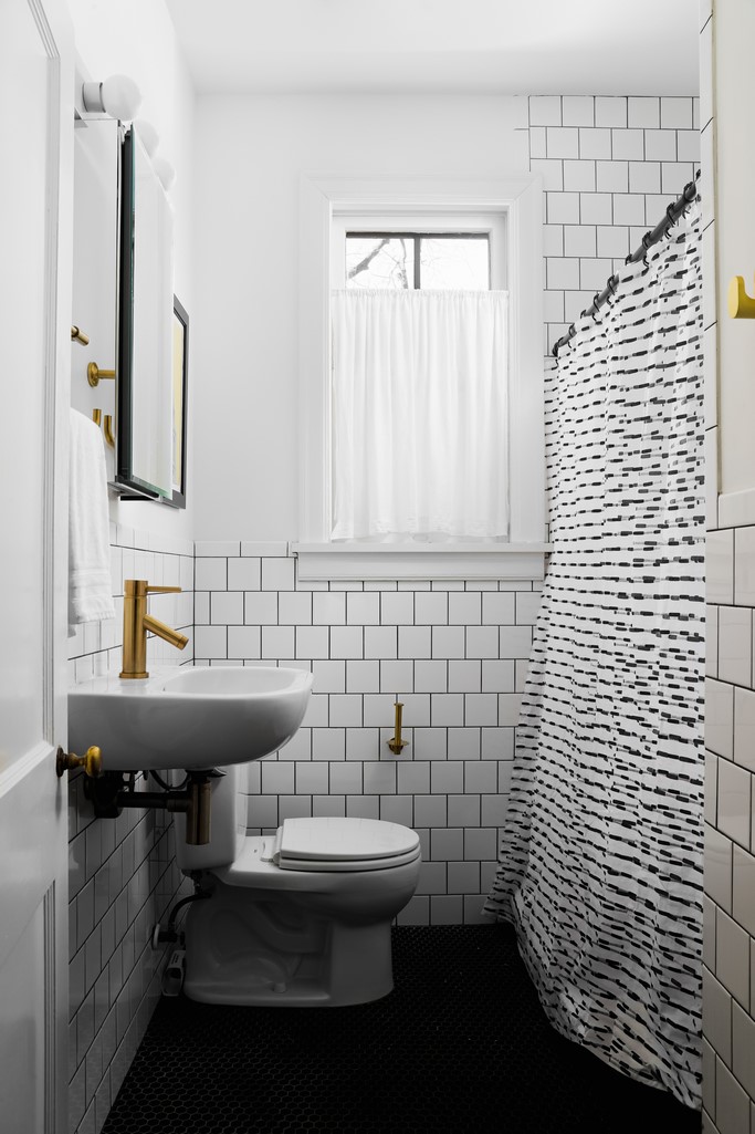 3812 Duval Street Austin, TX 78751 - Photo 16 of 22 a bathroom with a sink toilet and mirror