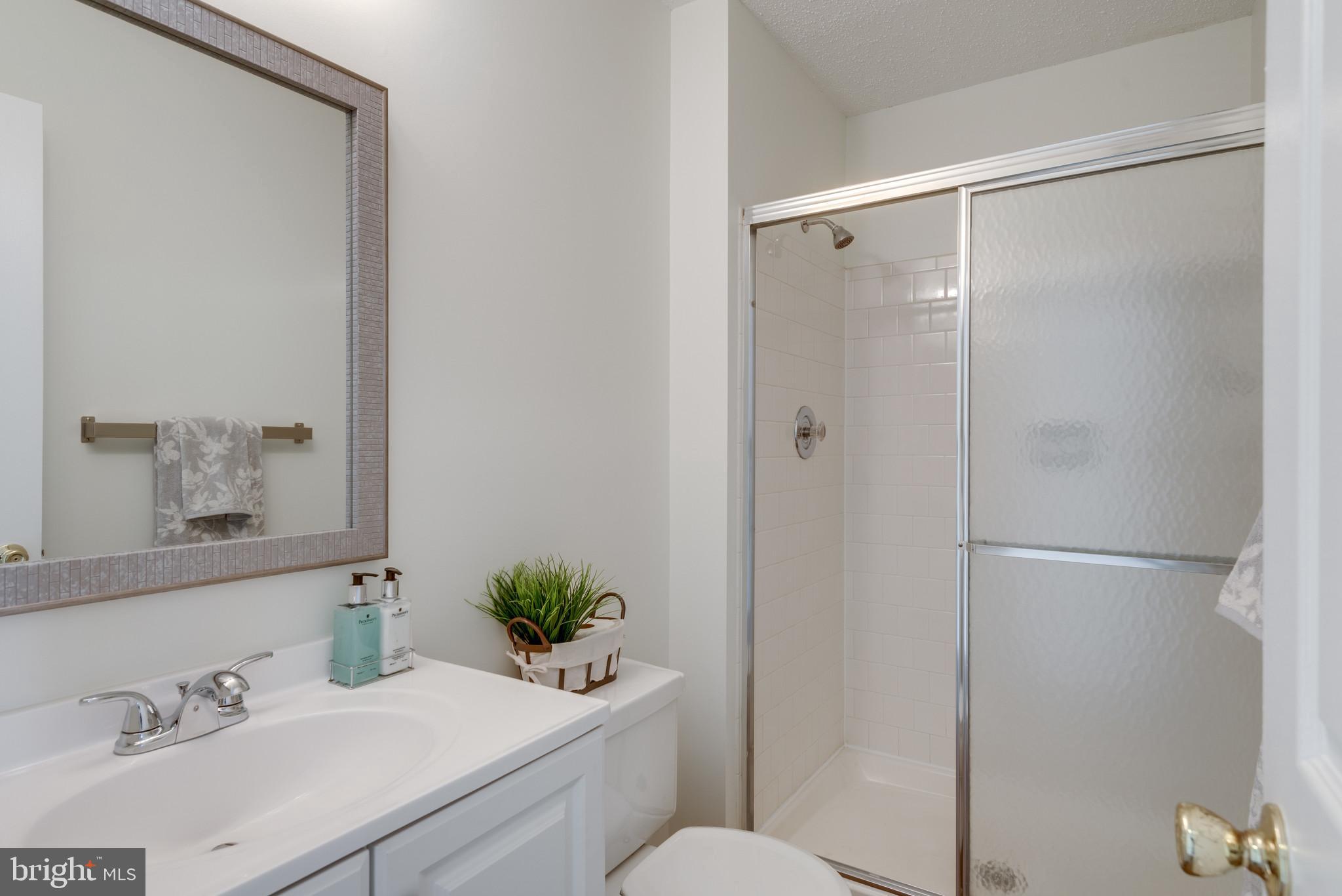 114 Fort Evans Road Southeast, Unit E Leesburg, VA 20175 - Photo 16 of 34 Updated Hall bath