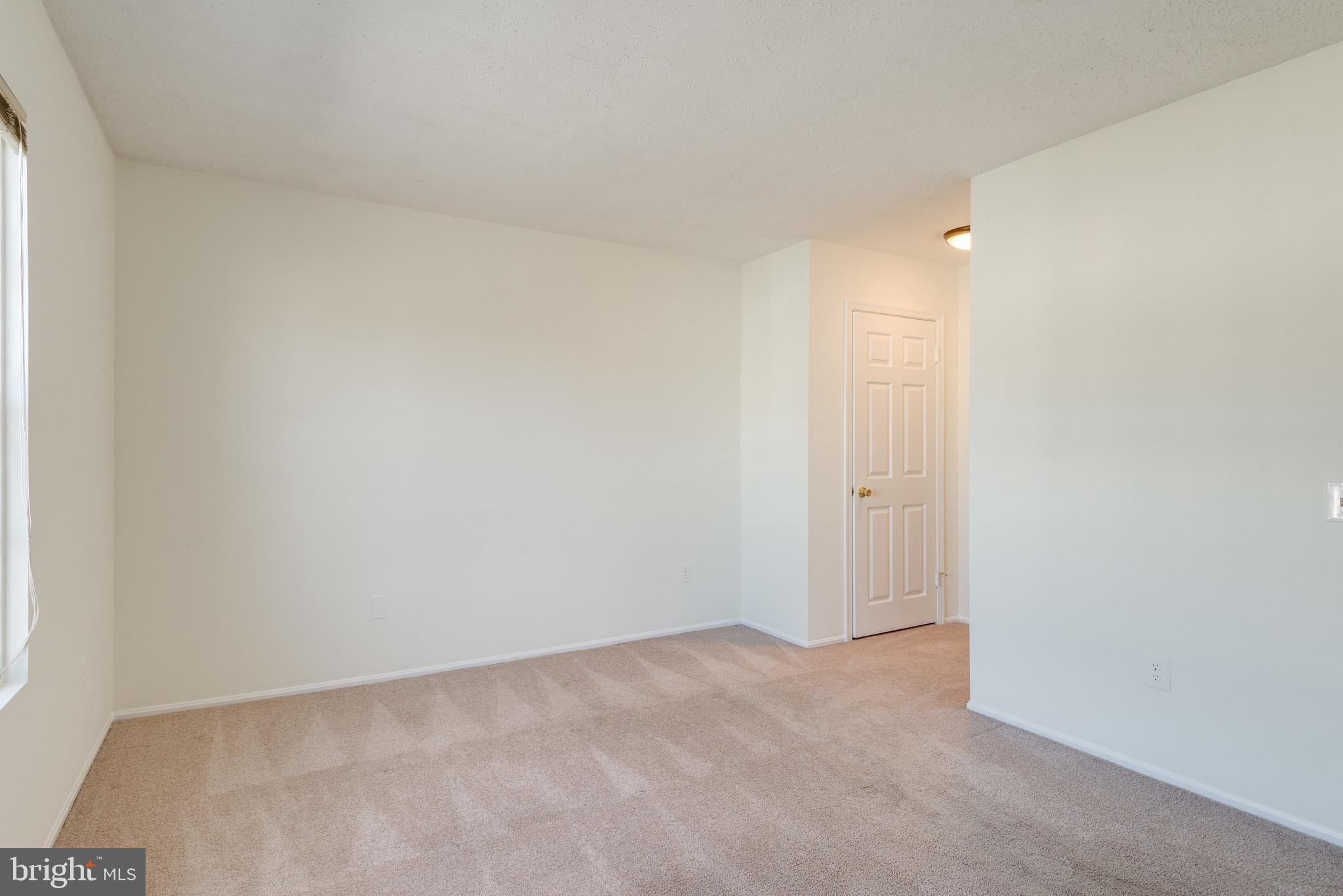 114 Fort Evans Road Southeast, Unit E Leesburg, VA 20175 - Photo 21 of 34 Primary bedroom