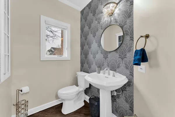a spacious bathroom with a bathtub and shower
