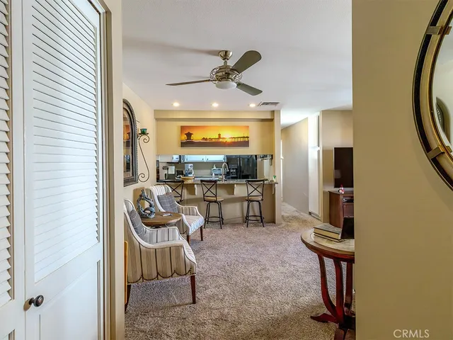 a room with furniture and gym equipment