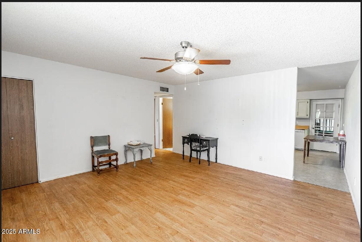 18422 North 30th Lane Phoenix, AZ 85053 - Photo 3 of 16 a bedroom with a bed and a table in it