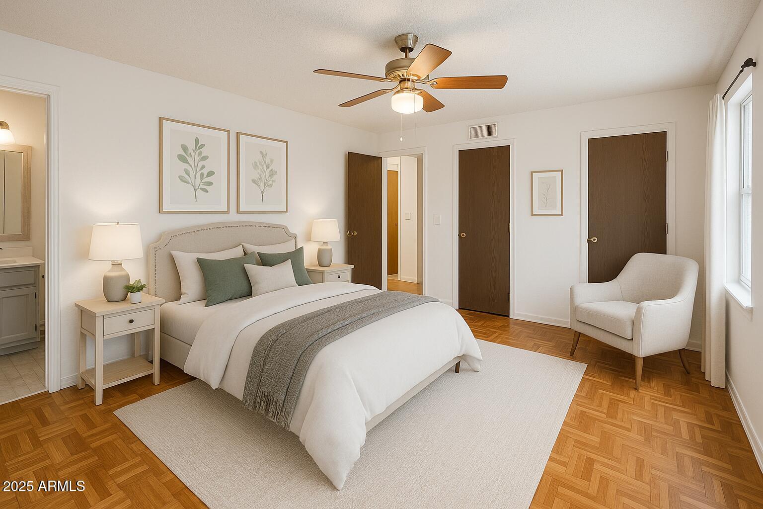 18422 North 30th Lane Phoenix, AZ 85053 - Photo 8 of 16 a bedroom with a bed and ceiling fan