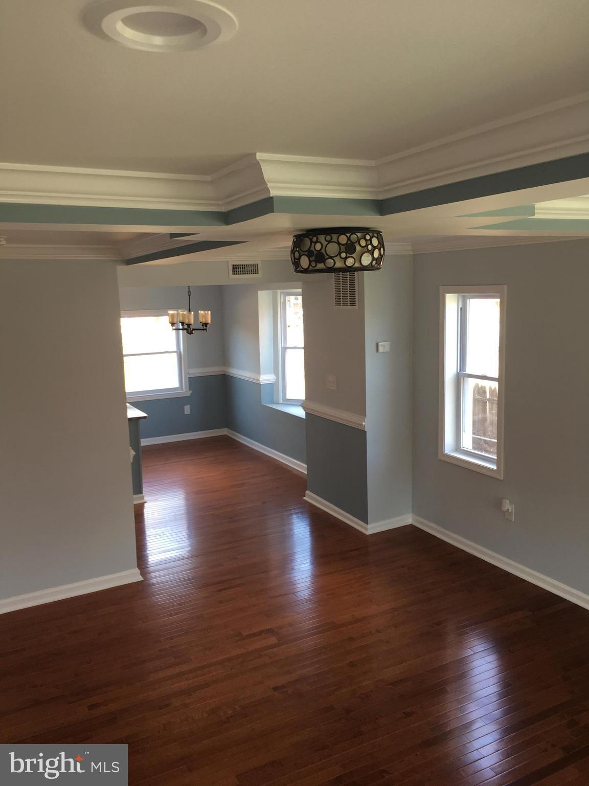 926 Arncliffe Road Baltimore, MD 21221 - Photo 2 of 24 a view of livingroom and hardwood
