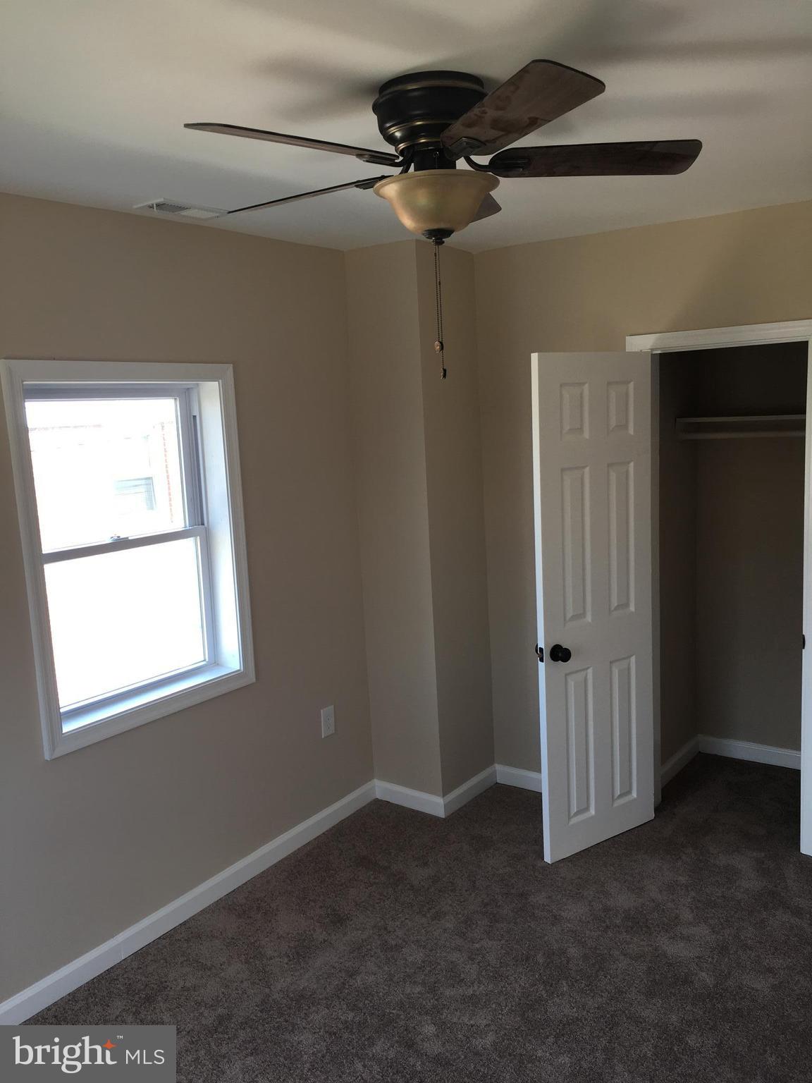 926 Arncliffe Road Baltimore, MD 21221 - Photo 13 of 24 an empty room with a window