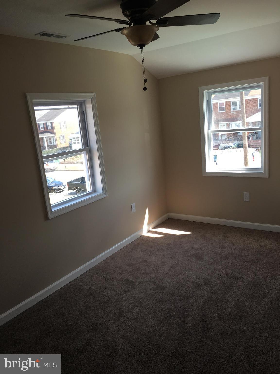 926 Arncliffe Road Baltimore, MD 21221 - Photo 15 of 24 a view of empty room with window