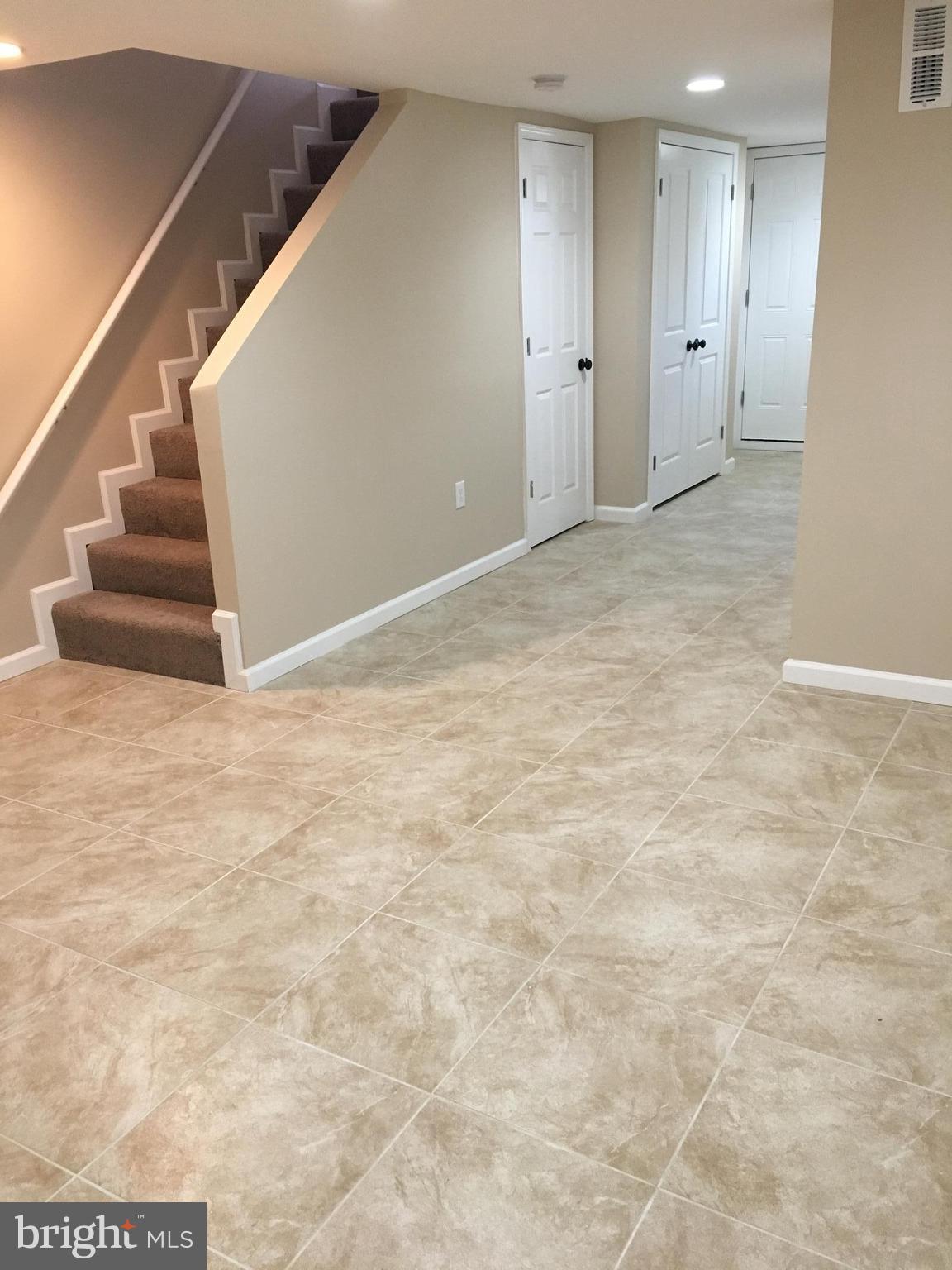 926 Arncliffe Road Baltimore, MD 21221 - Photo 22 of 24 a view of an empty room with stairs