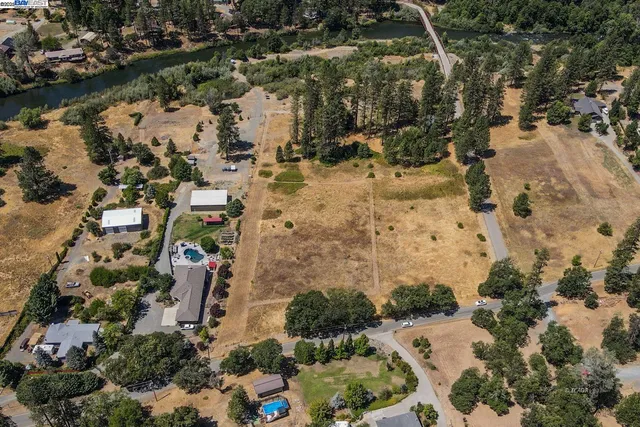 an aerial view of residential house with outdoor space