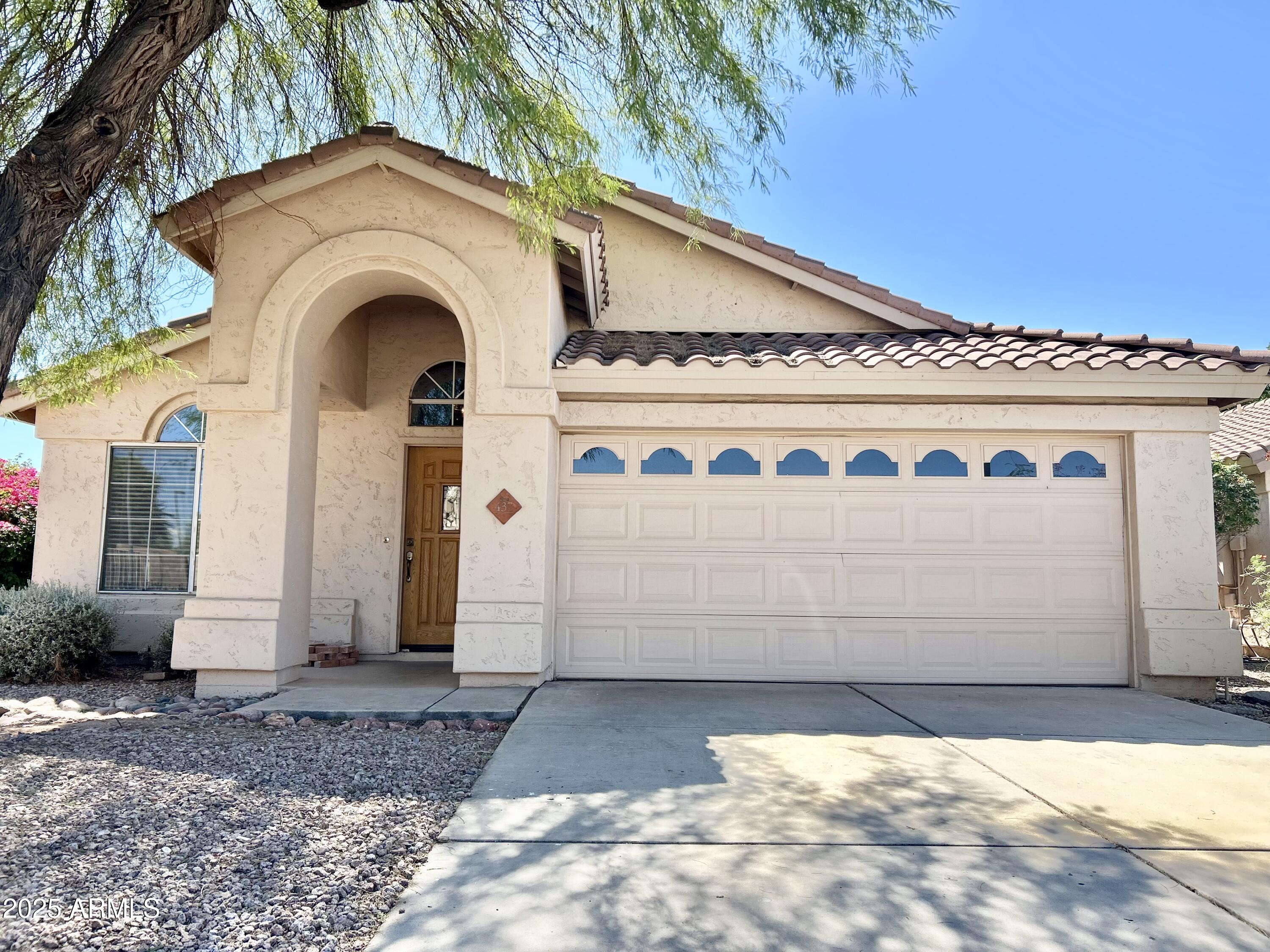 437 West San Angelo Gilbert, AZ 85233 - Photo 1 of 21 a front view of a house