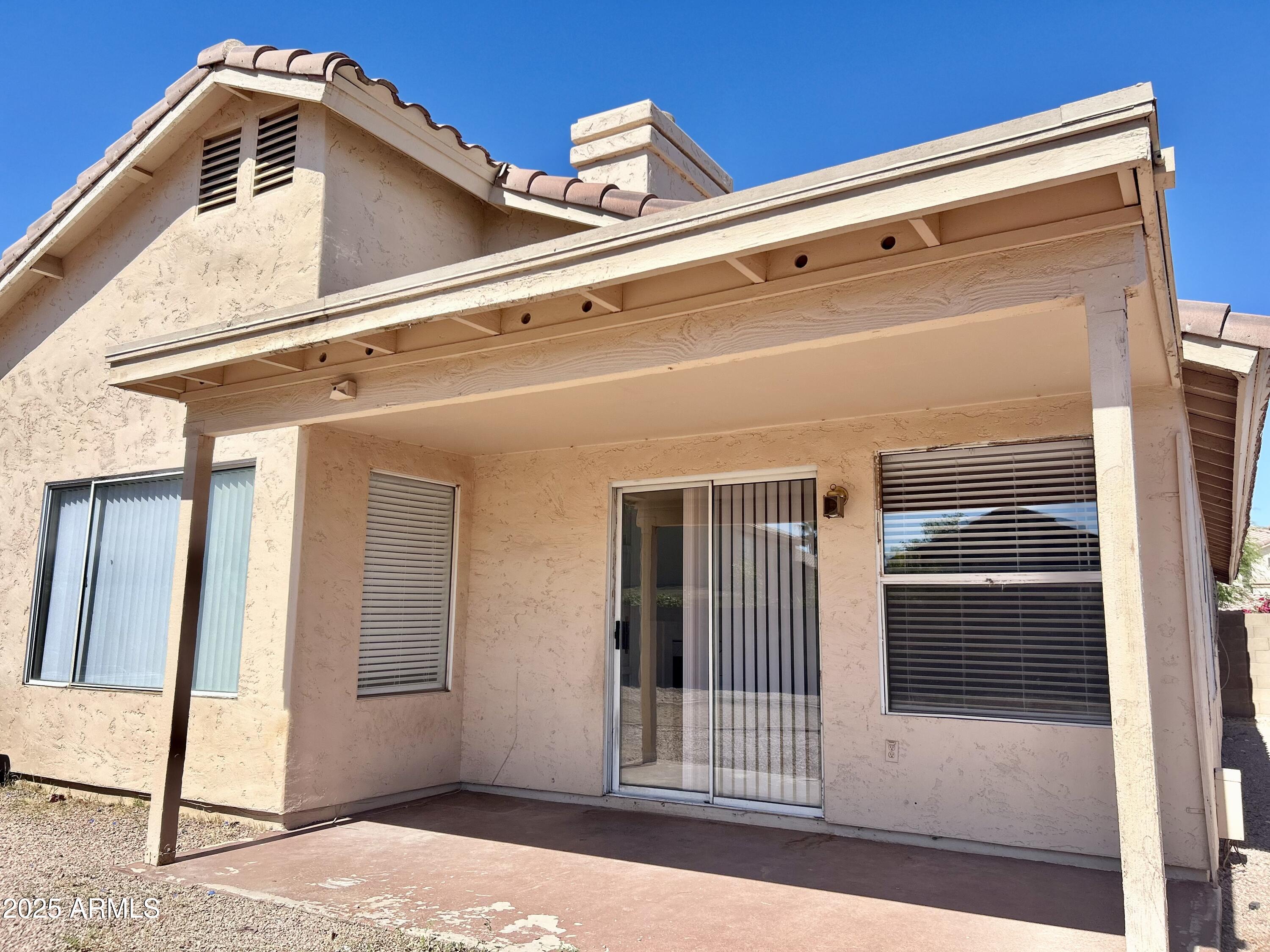 437 West San Angelo Gilbert, AZ 85233 - Photo 21 of 21 a view of a house with a door