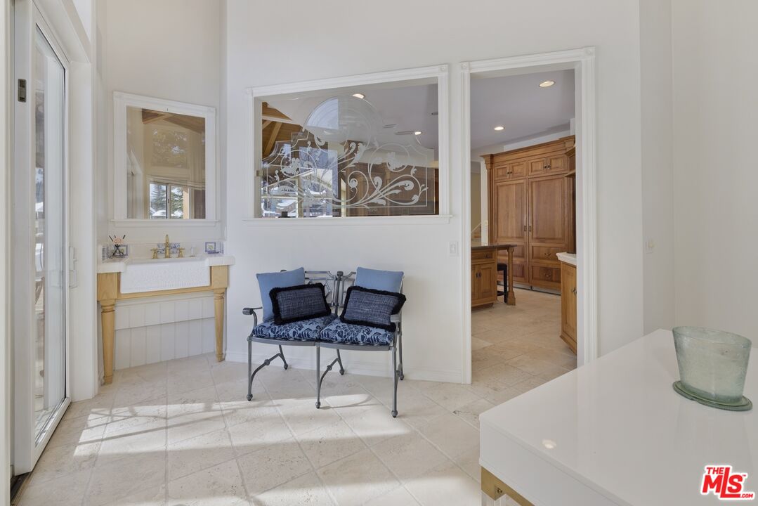 370 Ranch Road Mammoth Lakes, CA 93546 - Photo 13 of 38 a living room with furniture and painting on the wall