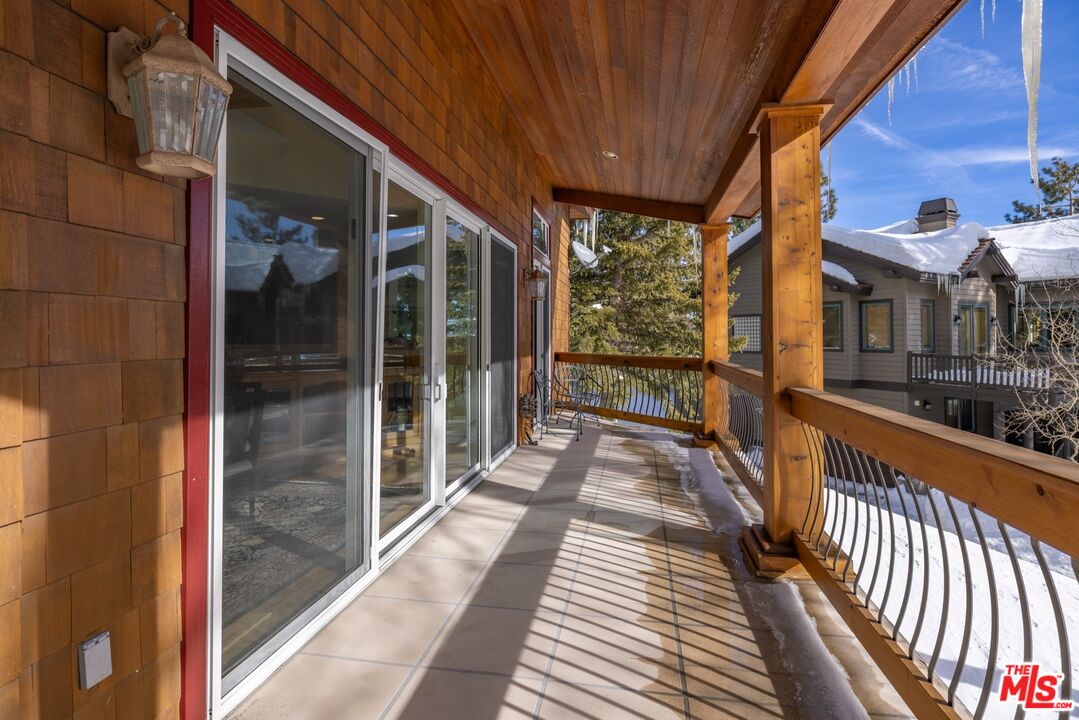 370 Ranch Road Mammoth Lakes, CA 93546 - Photo 16 of 38 a view of a house with a glass door