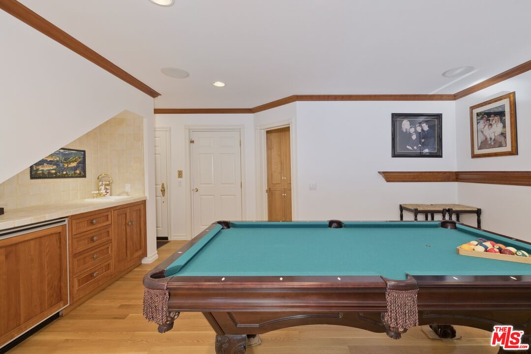 370 Ranch Road Mammoth Lakes, CA 93546 - Photo 21 of 38 a room with pool table and windows