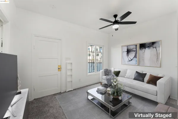 a living room with furniture and window