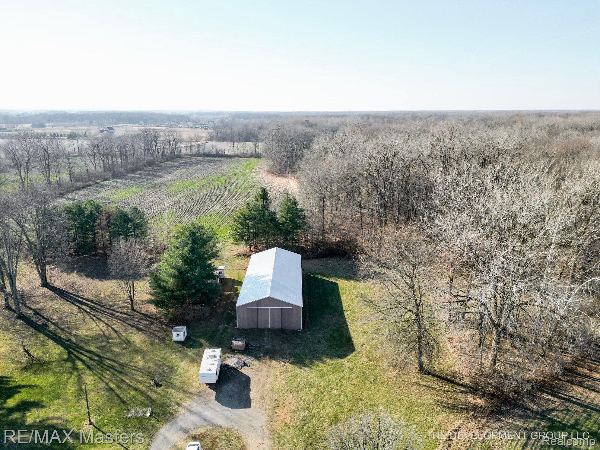 12527 Sumpter Road Carleton, MI 48117 - Photo 33 of 33 Fields behind the home and plenty of woods too!