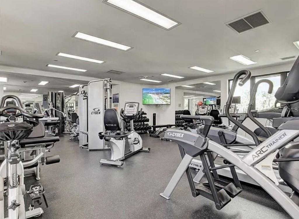 1926 Harbourside Drive, Unit 1302 Longboat Key, FL 34228 - Photo 28 of 31 a view of a room with gym equipment