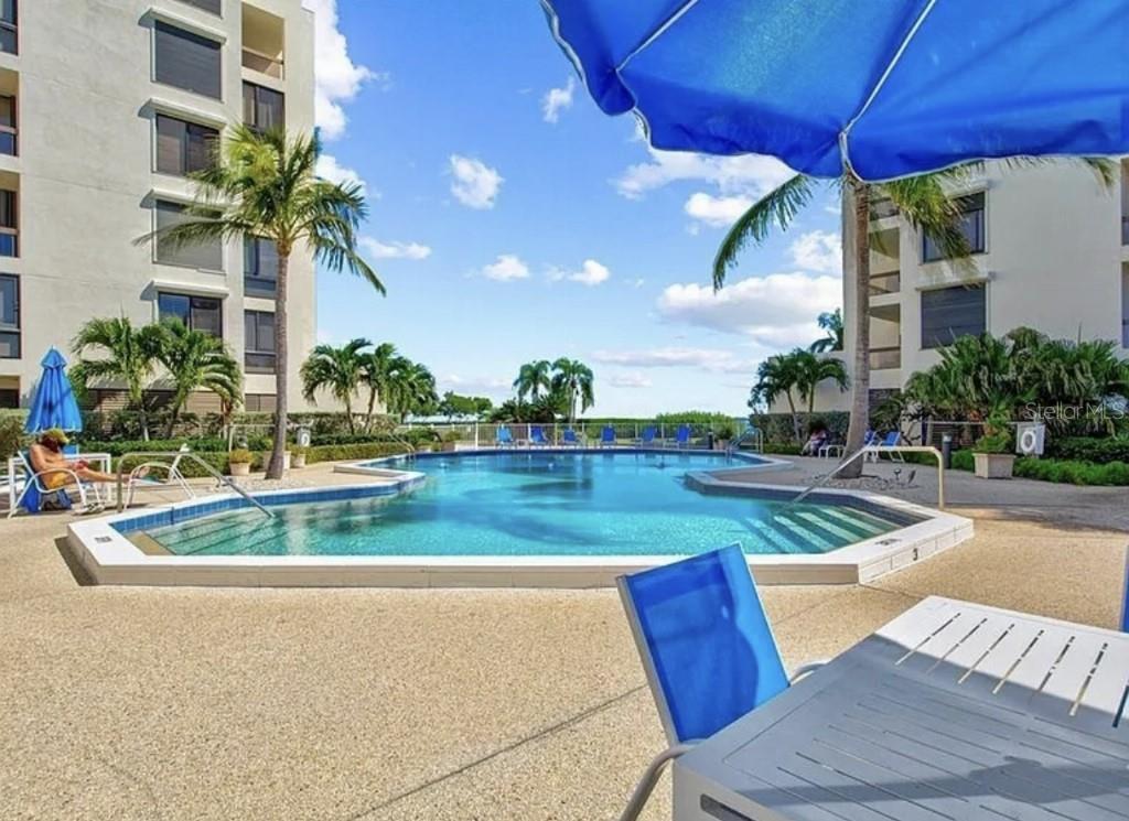 1926 Harbourside Drive, Unit 1302 Longboat Key, FL 34228 - Photo 30 of 31 a view of yard with outdoor seating