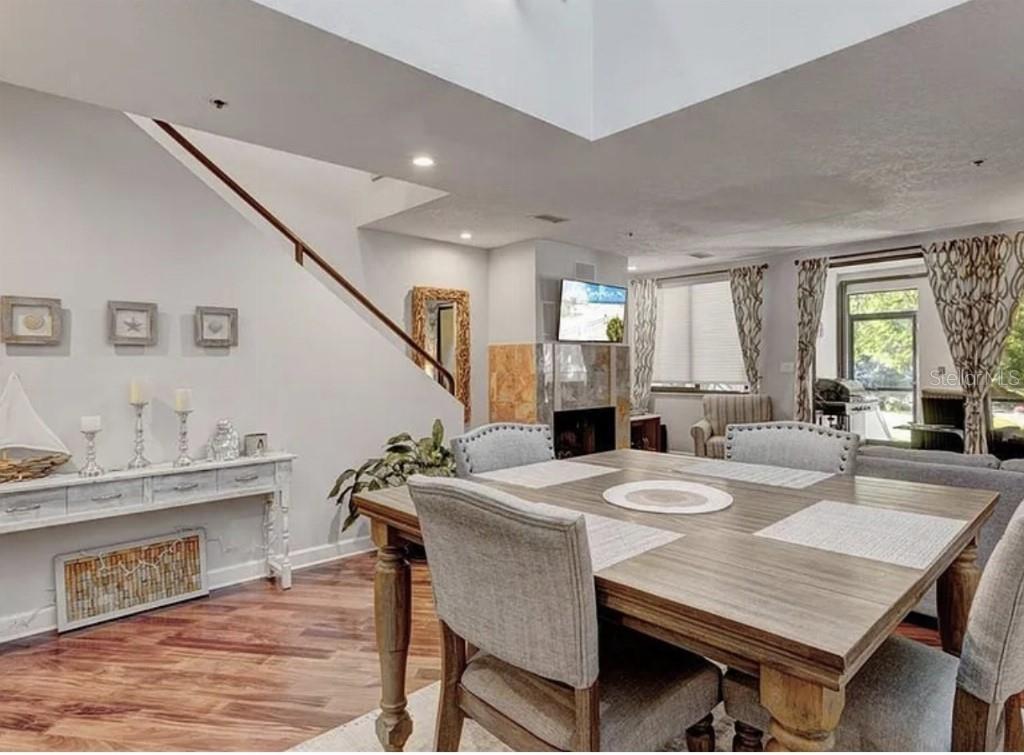 1926 Harbourside Drive, Unit 1302 Longboat Key, FL 34228 - Photo 4 of 31 a view of a dining room kitchen and a window