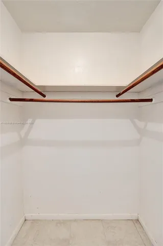 a view of a balcony with chairs