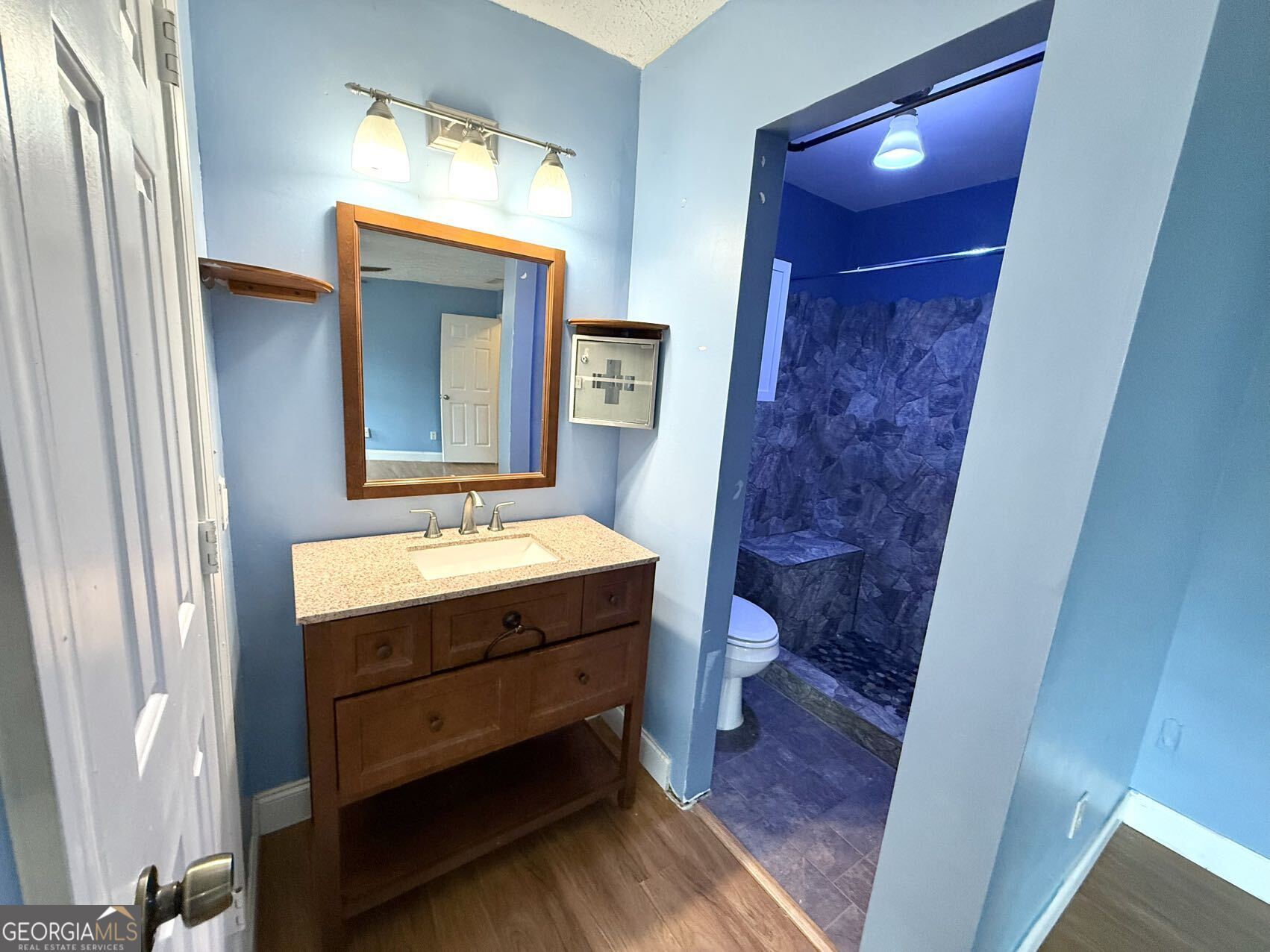 1220 Kennesaw Trace Court Kennesaw, GA 30144 - Photo 12 of 21 a bathroom with a sink and a mirror