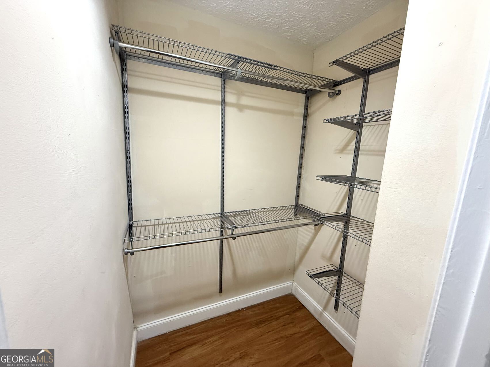1220 Kennesaw Trace Court Kennesaw, GA 30144 - Photo 14 of 21 a bathroom with a glass shower door and a window
