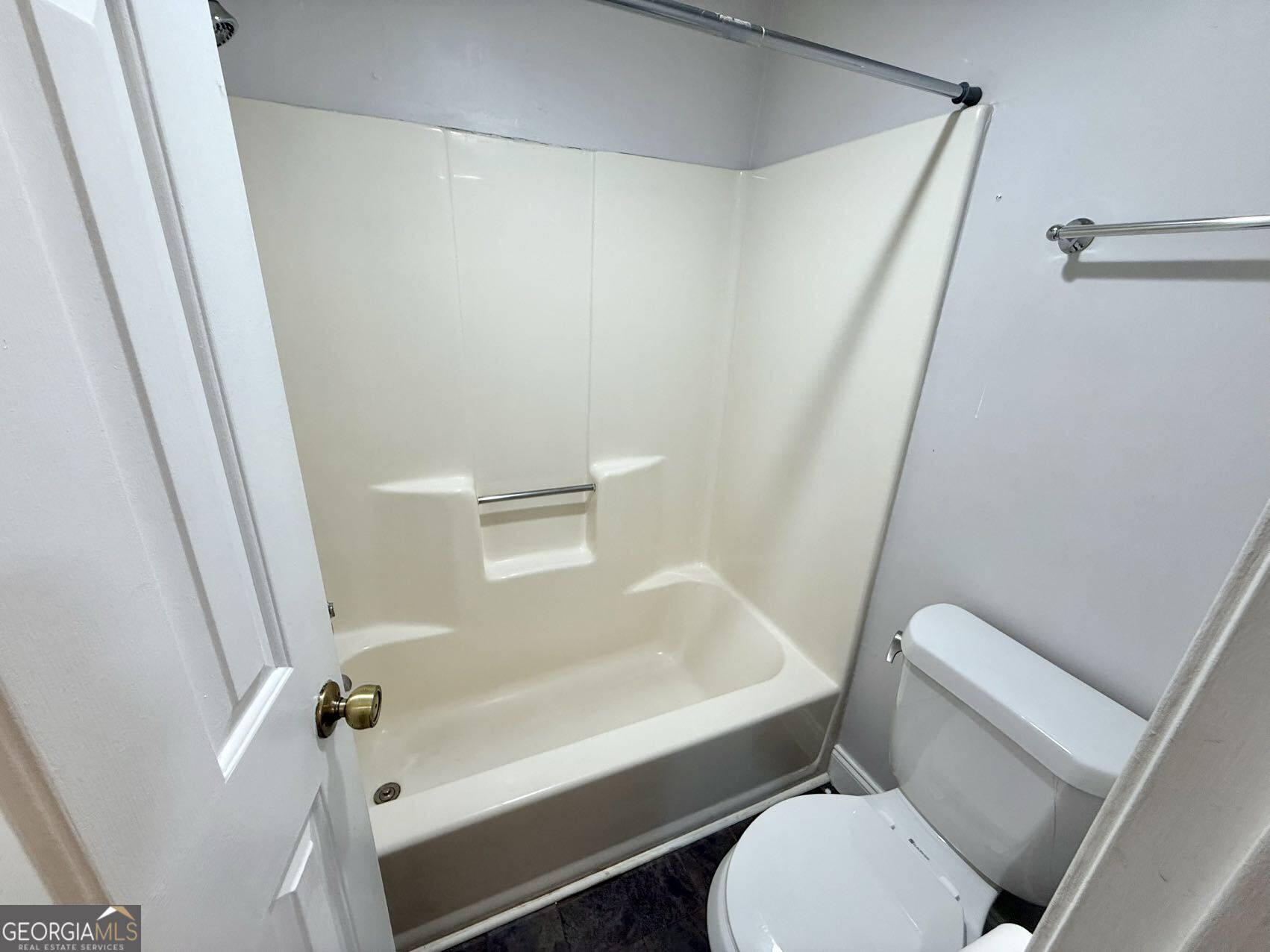 1220 Kennesaw Trace Court Kennesaw, GA 30144 - Photo 18 of 21 a bathroom with a sink and a tub