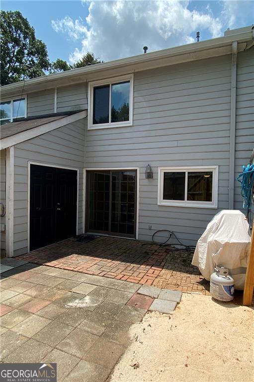 1220 Kennesaw Trace Court Kennesaw, GA 30144 - Photo 20 of 21 a front view of a house with a yard