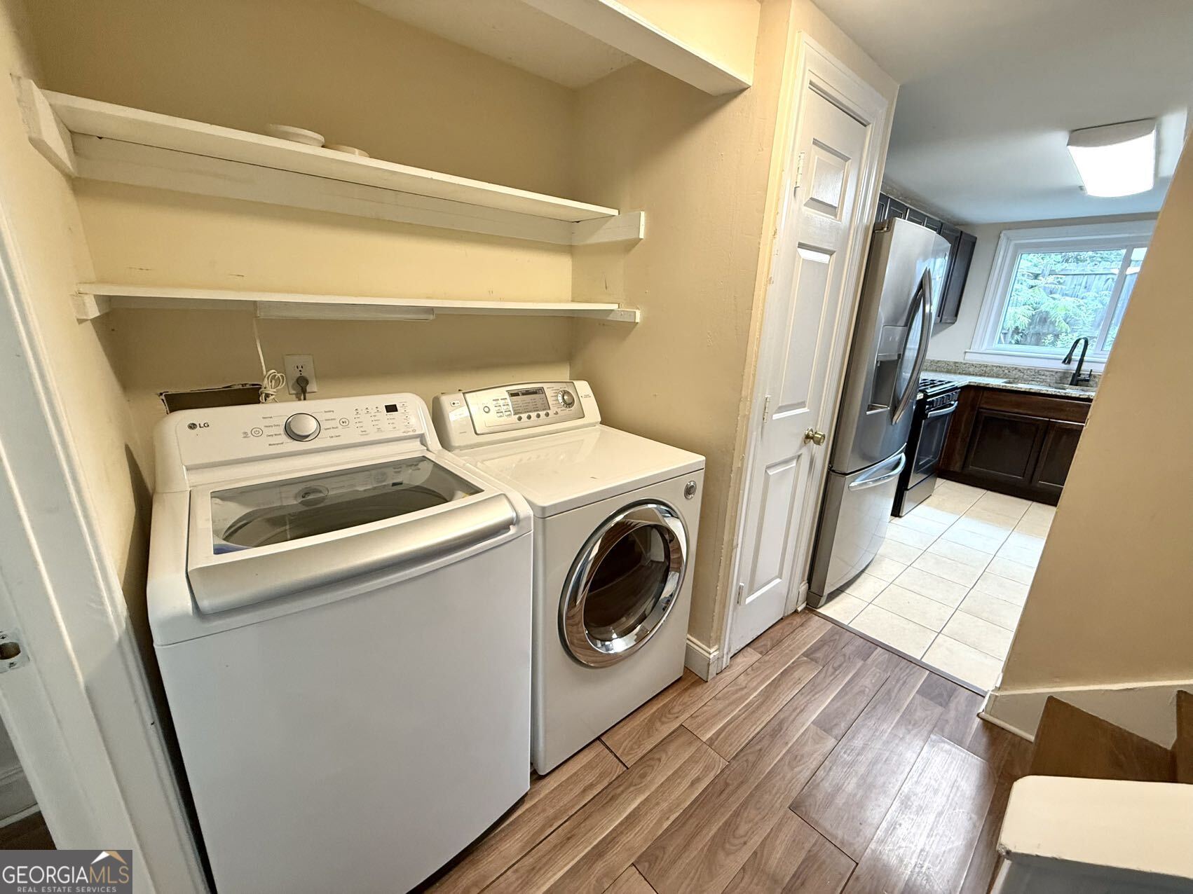 1220 Kennesaw Trace Court Kennesaw, GA 30144 - Photo 5 of 21 a utility room with dryer and washer