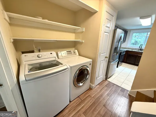 a utility room with dryer and washer