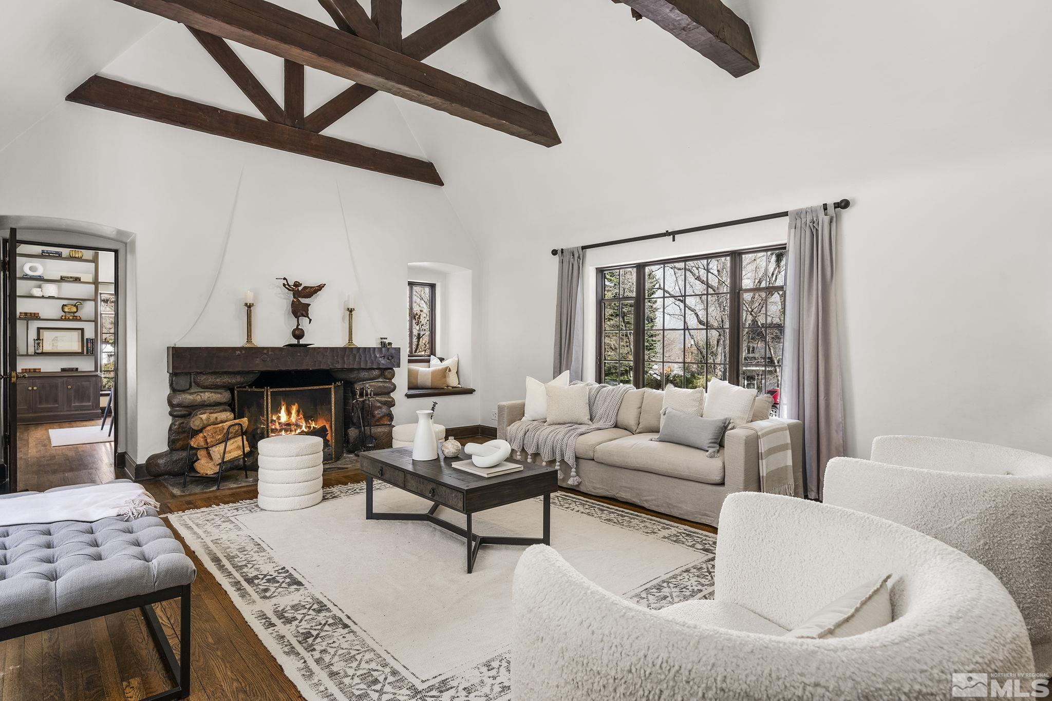 751 Marsh Avenue Reno, NV 89509 - Photo 13 of 39 a living room with furniture and a fireplace