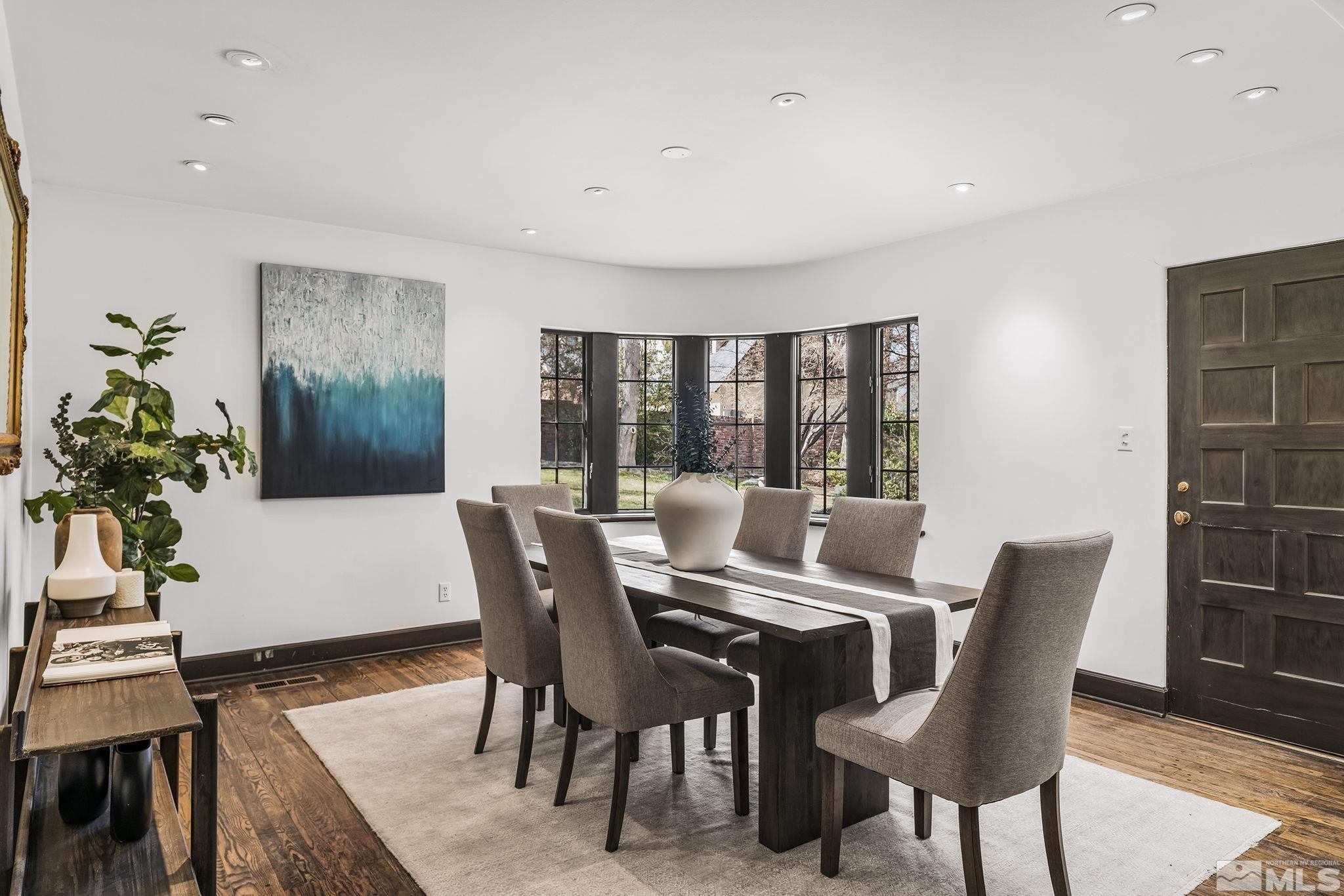 751 Marsh Avenue Reno, NV 89509 - Photo 17 of 39 a view of a dining room with furniture window and wooden floor