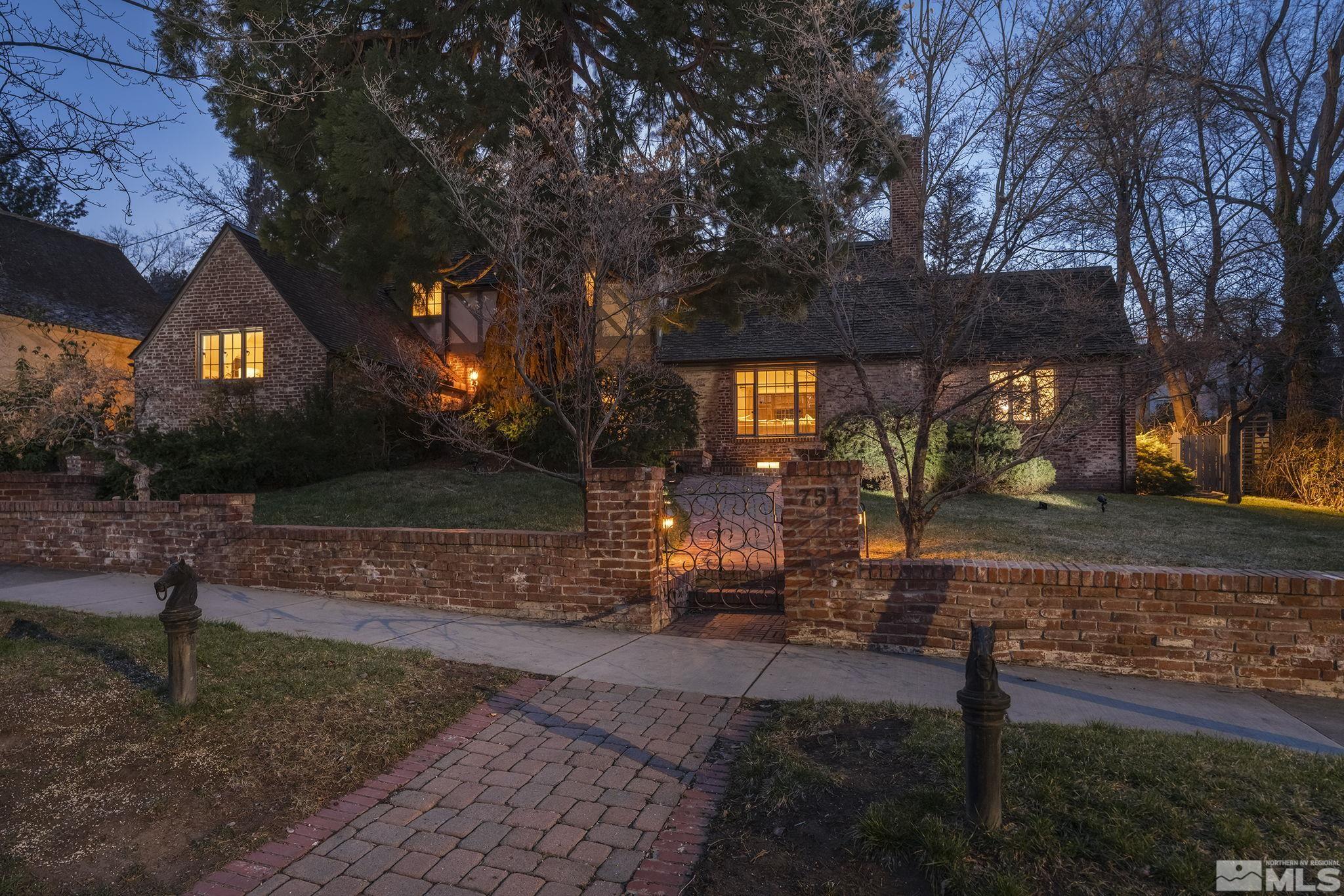 751 Marsh Avenue Reno, NV 89509 - Photo 2 of 39 a front view of a house with a yard