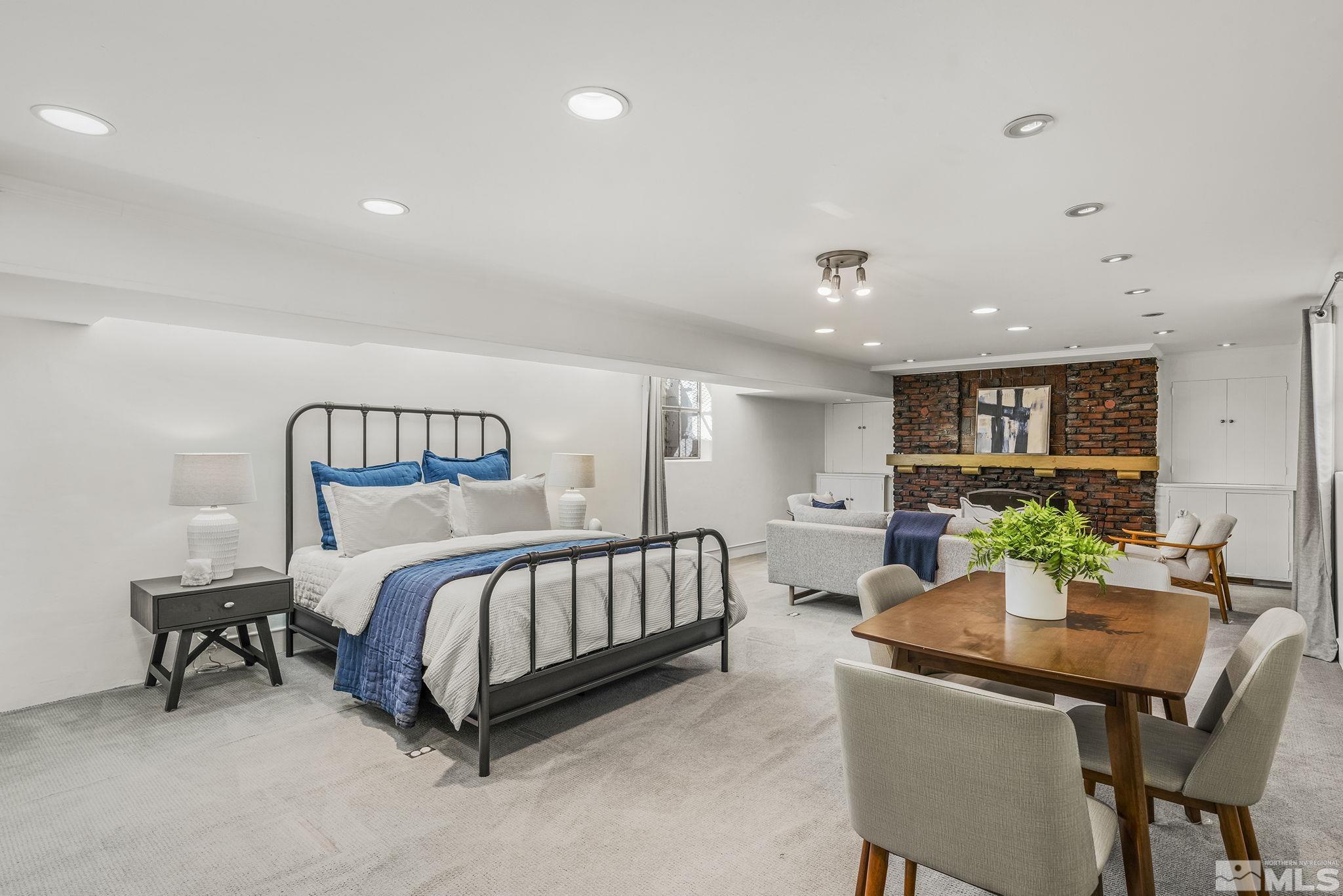 751 Marsh Avenue Reno, NV 89509 - Photo 27 of 39 a bedroom with a bed and a table