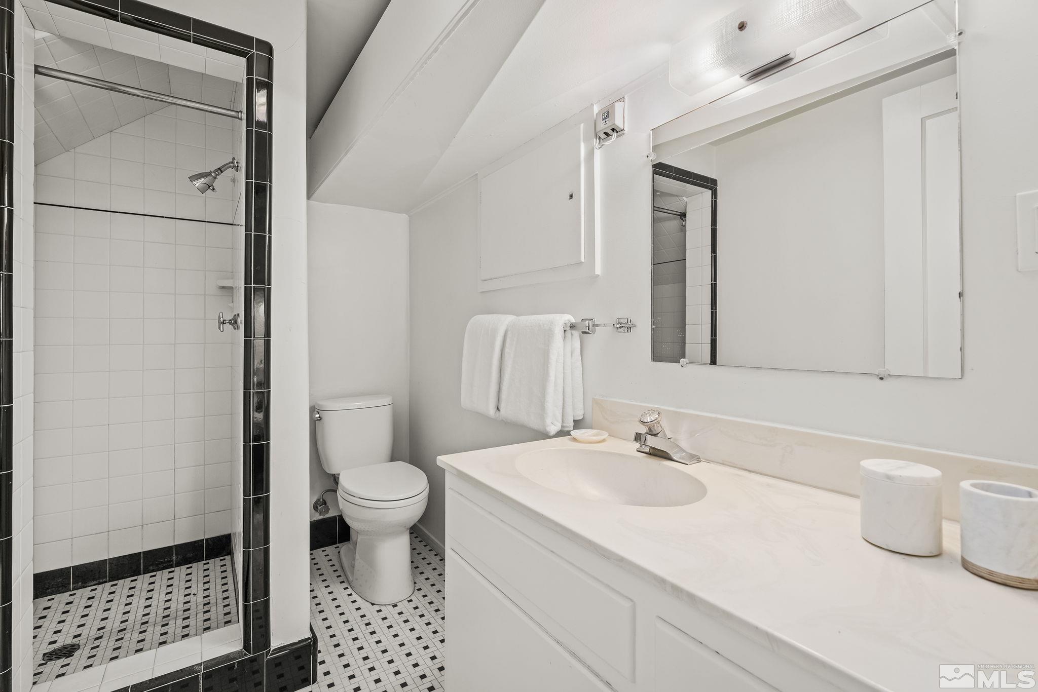 751 Marsh Avenue Reno, NV 89509 - Photo 30 of 39 a bathroom with a sink toilet and shower