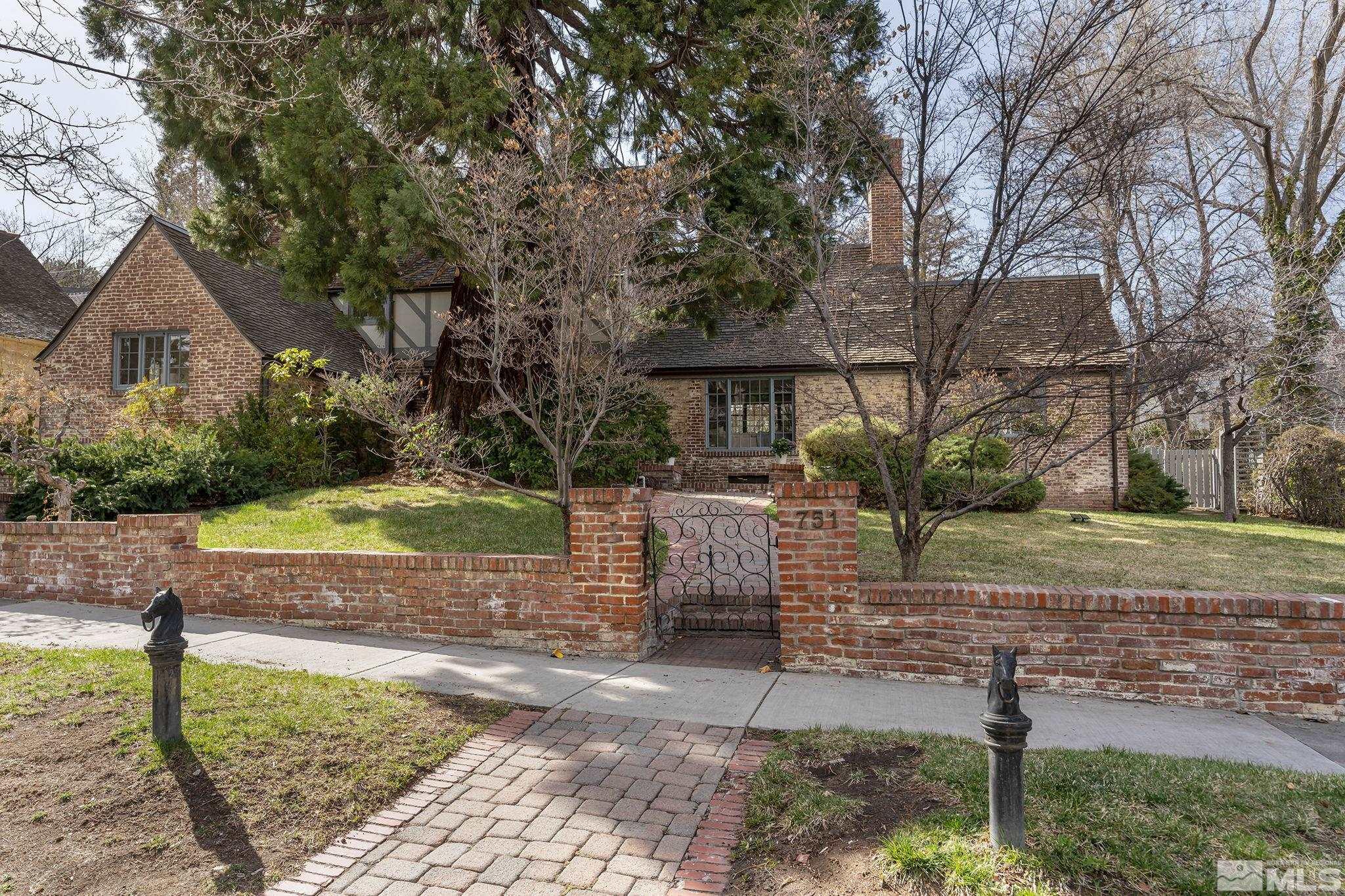 751 Marsh Avenue Reno, NV 89509 - Photo 4 of 39 a view of house with a yard and a large tree