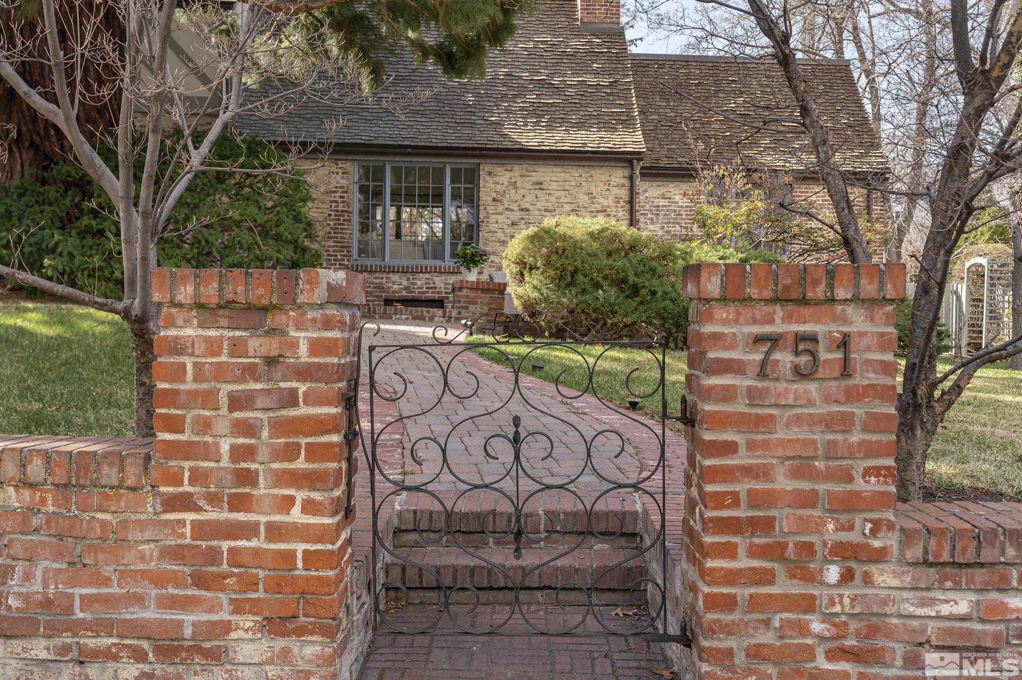751 Marsh Avenue Reno, NV 89509 - Photo 5 of 39 a front view of a house with a garden