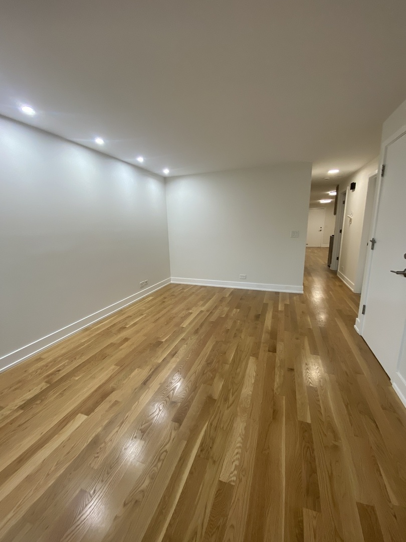 3270 North Elston Avenue, Unit 1 Chicago, IL 60618 - Photo 3 of 13 a view of empty room