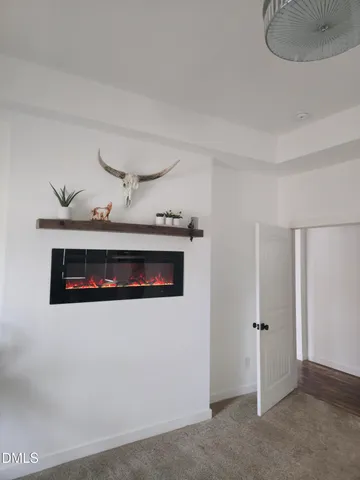 a view of a livingroom with furniture