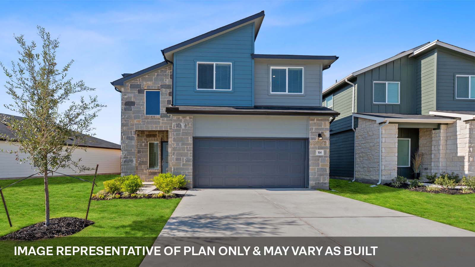 275 Mountain Pea Road Kyle, TX 78640 - Photo 1 of 22 a front view of a house with a garden and yard