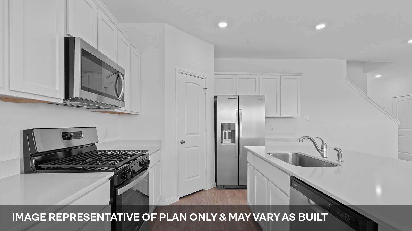 275 Mountain Pea Road Kyle, TX 78640 - Photo 6 of 22 a kitchen with stainless steel appliances granite countertop a sink stove and refrigerator