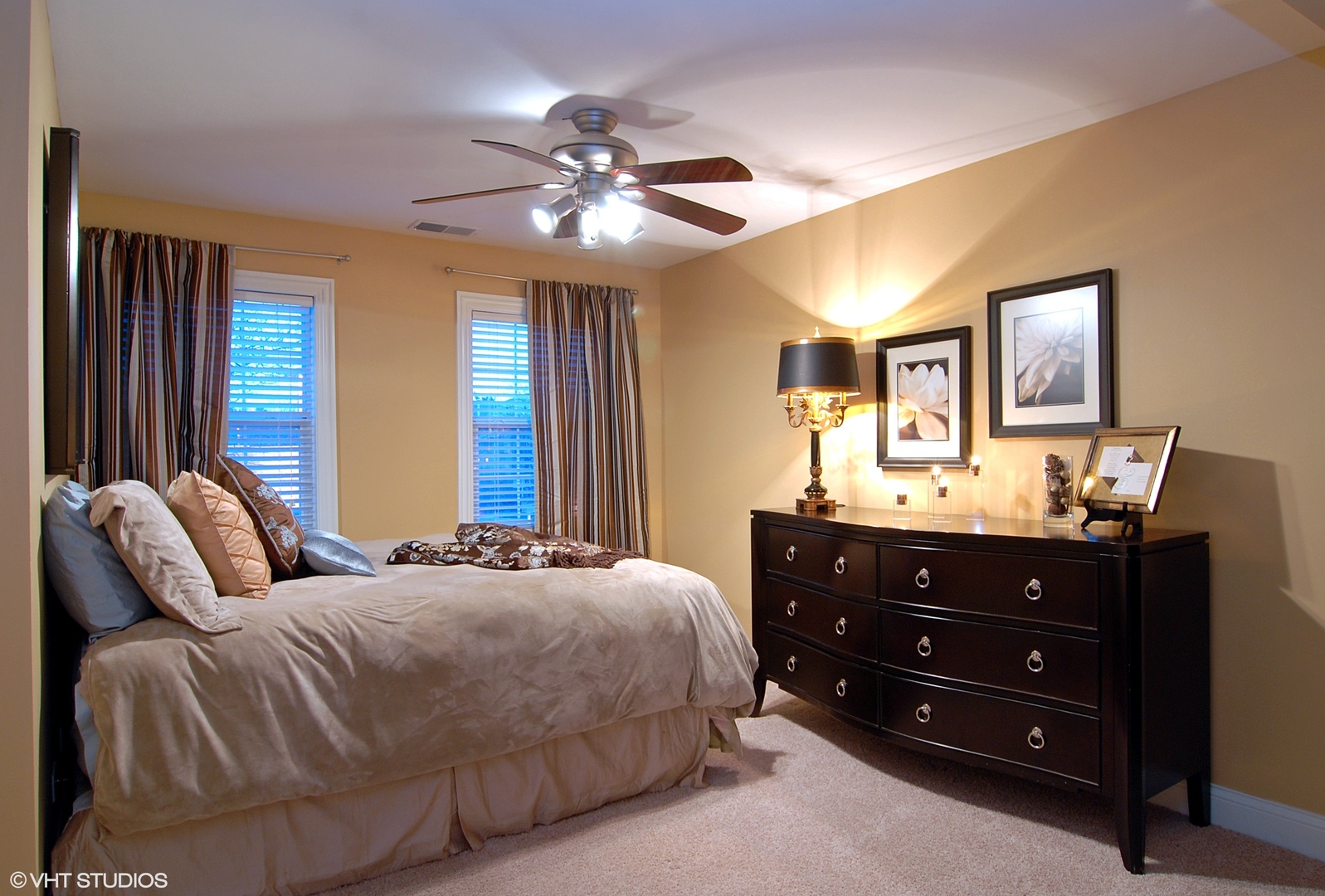 19 Foxcroft Road, Unit 219 Naperville, IL 60565 - Photo 7 of 14 a bedroom with a bed and a chandelier
