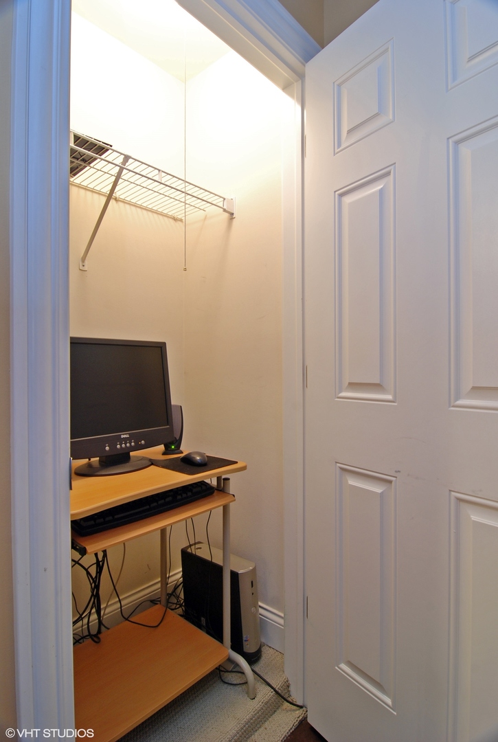 19 Foxcroft Road, Unit 219 Naperville, IL 60565 - Photo 9 of 14 a view of a workspace with furniture and a window