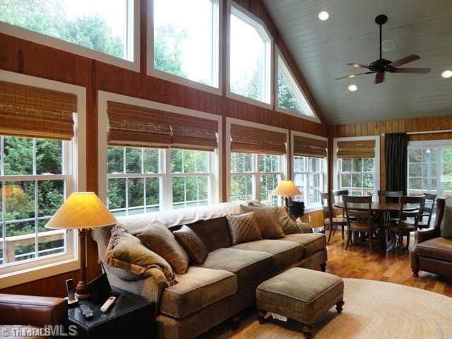 1212 Gatehouse Road High Point, NC 27262 - Photo 9 of 16 Sunroom. Wonderful Sunroom overlooking yard (heated and cooled) custom Hunter-Douglas shades